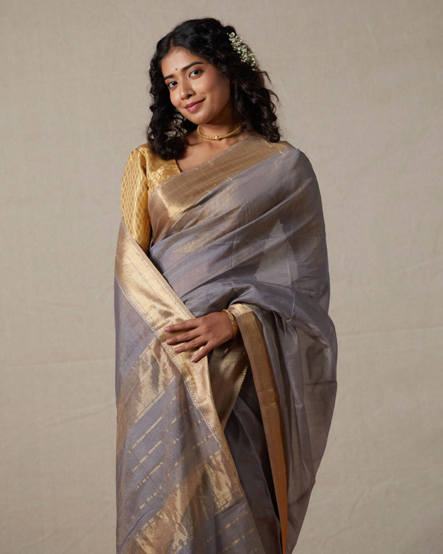 Grey Maheshwari Tissue Saree With Gold Zari Border